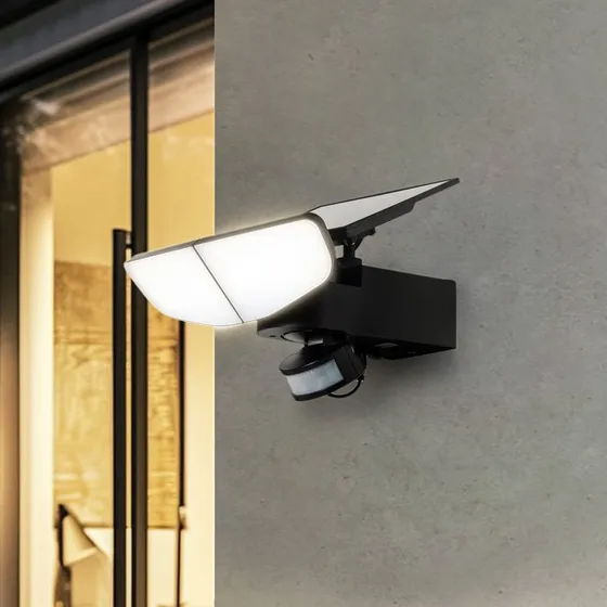 Lindby LED-Solarwandleuchte Naelin, czarna, z czujnikiem ruchu